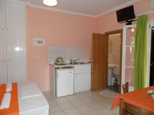 Кухня или мини-кухня в Green Villa

