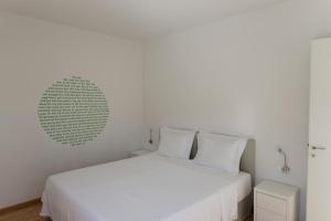 Letto o letti in una camera di Villa Gonia