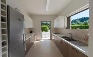 Cucina o angolo cottura di Villa Gonia
