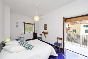 Un ou plusieurs lits dans un hébergement de l'établissement Reginella