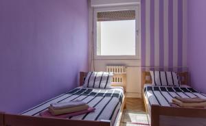 Katil atau katil-katil dalam bilik di Sunny Apartment