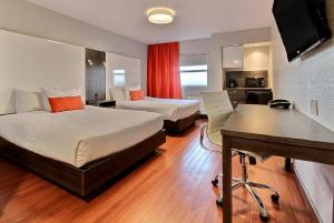 Ένα ή περισσότερα κρεβάτια σε δωμάτιο στο Hotel Classique