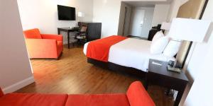 Ένα ή περισσότερα κρεβάτια σε δωμάτιο στο Hotel Classique