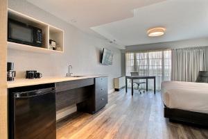Ένα ή περισσότερα κρεβάτια σε δωμάτιο στο Hotel Classique