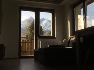 Nespecifikovaný výhled na hory nebo výhled na hory při pohledu z apartmánu