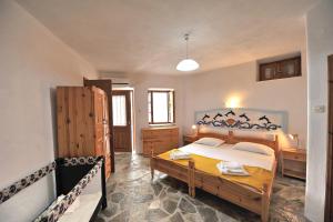 Posteľ alebo postele v izbe v ubytovaní Secret Sporades Panoramic Residence