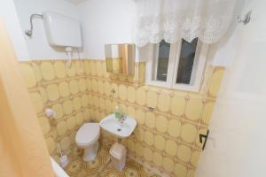 Kupatilo u objektu Apartman Lucijan