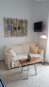 A television and/or entertainment centre at Nesaea Studio