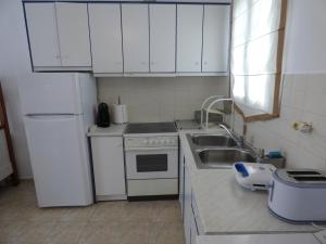 A kitchen or kitchenette at Nesaea Studio