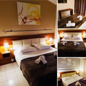 a hotel room with two beds and two lamps at Hotel Les Hauts de Porto-Vecchio in Porto-Vecchio