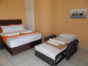 Кровать или кровати в номере Green Villa
