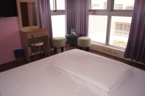 Postel nebo postele na pokoji v ubytování Shimmer B&B