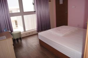 Postel nebo postele na pokoji v ubytování Shimmer B&B