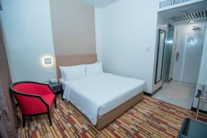 Letto o letti in una camera di Harbour View Hotel