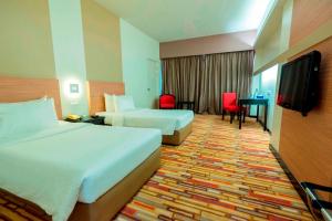 Letto o letti in una camera di Harbour View Hotel