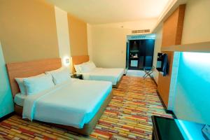 Letto o letti in una camera di Harbour View Hotel