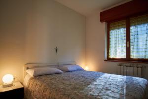 Posteľ alebo postele v izbe v ubytovaní B&B La Bredia