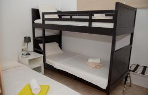Postel nebo postele na pokoji v ubytování Lagada Resort