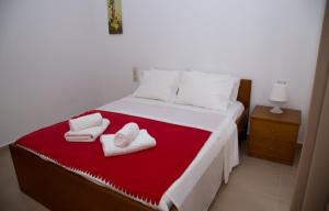 Postel nebo postele na pokoji v ubytování Lagada Resort