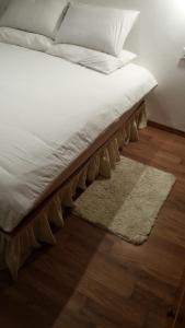 Letto o letti in una camera di Alona