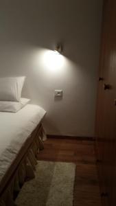 Letto o letti in una camera di Alona