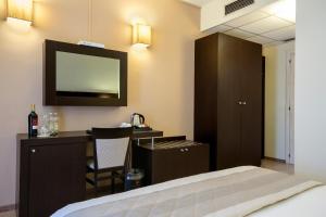 Postel nebo postele na pokoji v ubytování Hotel Executive