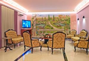 TV a/nebo společenská místnost v ubytování Hotel Jardim