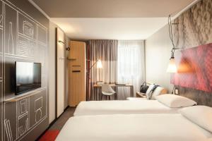 Postel nebo postele na pokoji v ubytování ibis Baden Neuenhof + 37 fotografií