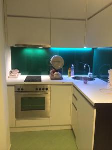 A kitchen or kitchenette at Modern Studio 20 Meters from Mladost 1 Metro Station Még 7 kép