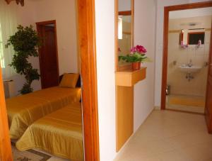 Posteľ alebo postele v izbe v ubytovaní BALATON ART Apartman