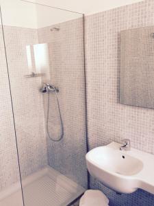 a bathroom with a shower and a sink at B&B San Vito in San Vito lo Capo
