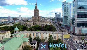 an aerial view of a city with a clock tower at Warsaw Hostel Centrum Private Rooms & Dorms in Warsaw