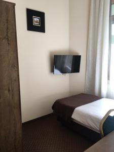 Posteľ alebo postele v izbe v ubytovaní Matejko Hotel