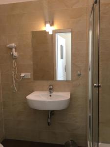 Kúpeľňa v ubytovaní Matejko Hotel