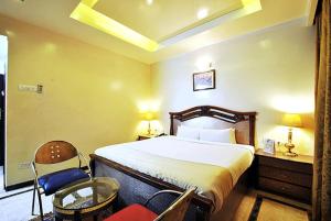 Postel nebo postele na pokoji v ubytování Hotel Zeeras + 11 fotografií