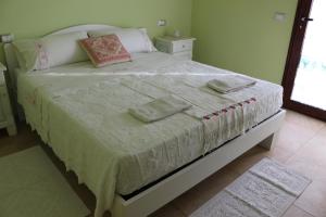 Postel nebo postele na pokoji v ubytování Sardinia for you