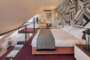 Posteľ alebo postele v izbe v ubytovaní Stories Boutique Hotel