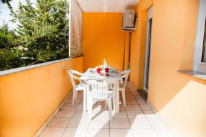 Balkón nebo terasa v ubytování Casa Vacanze Cau
