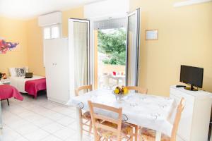TV a/nebo společenská místnost v ubytování Casa Vacanze Cau