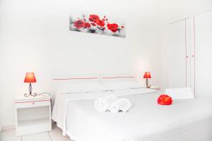 Postel nebo postele na pokoji v ubytování Casa Vacanze Cau