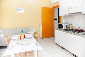 Kuchyň nebo kuchyňský kout v ubytování Casa Vacanze Cau