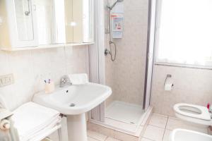 Koupelna v ubytování Casa Vacanze Cau + 37 fotografií