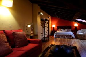 En eller flere senge i et værelse på Estrella rural casa rural en la Sierra de Madrid