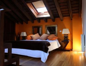 Cama o camas de una habitación en Estrella rural casa rural en la Sierra de Madrid
