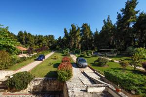 Vonkajšia záhrada v ubytovaní Sani Beach Villa