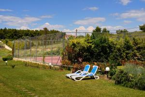 Vonkajšia záhrada v ubytovaní Sani Beach Villa