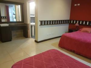 Ένα ή περισσότερα κρεβάτια σε δωμάτιο στο Hotel Don Horacio