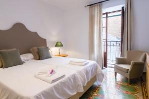 Ένα ή περισσότερα κρεβάτια σε δωμάτιο στο Villa Ca na Marrona - Sunset Villa Campanile +46 φωτογραφίες