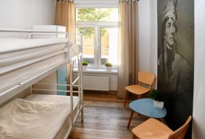 Posteľ alebo postele v izbe v ubytovaní Warsaw Hostel Centrum Private Rooms & Dorms + 37 fotografií