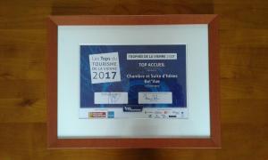 Um certificado, prémio, placa ou documento mostrado em Chambres D'hôtes Bel'vue